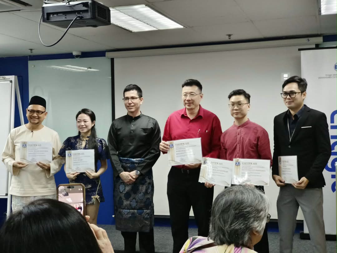 Enagic distributors receiving certificates at a recognition ceremony