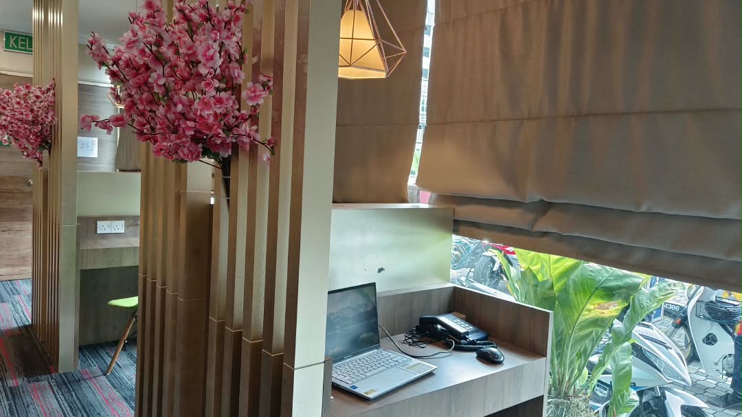 Cosy work corner with fresh blossoms and natural light