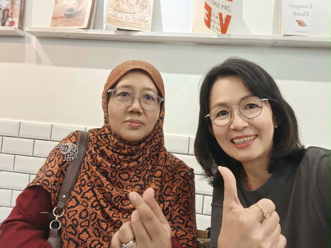 Coach Ida with a fellow coach during a coffee catch-up
