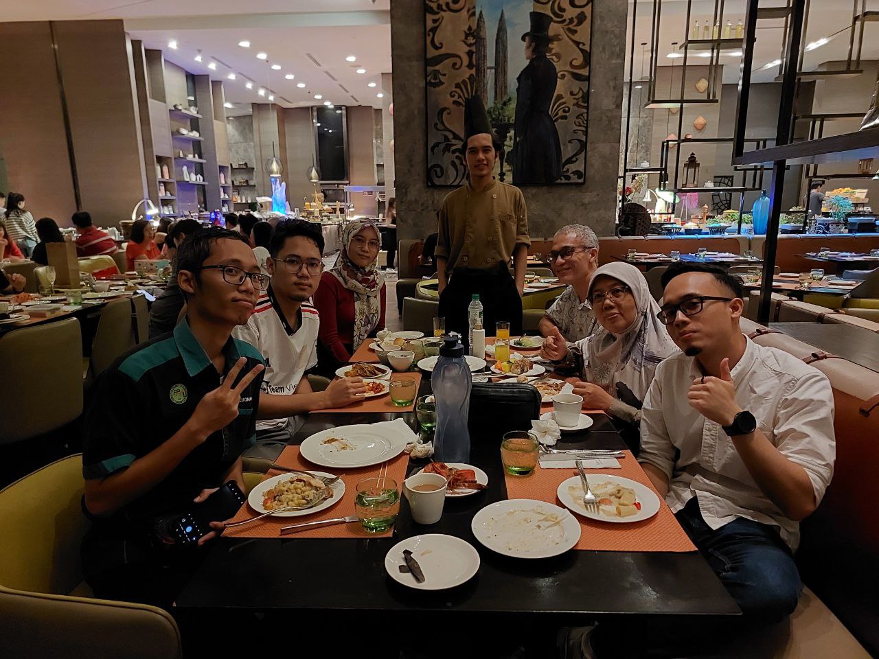 Family dinner together at a hotel buffet restaurant